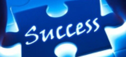 A symbol-filled jigsaw puzzle representing success in graphic design and science. Intricate graphics make up the puzzle, a challenge to solve.